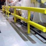 Yellow plastic sleeved steel pipe two-line standard guardrail with base plates