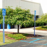 Blue and white U-Channel Covers on Handicap Parking Signs
