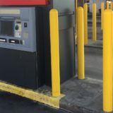 Yellow Bollard Covers Around ATM