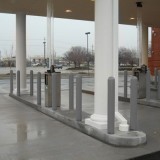 Gray Bollard Covers creating a professional appearance for a bank drive-thru