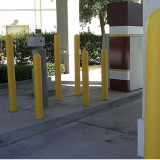 Yellow Bollard Covers used at a bank drive-thru