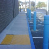 Architectural Decorative Bollard Covers with handicap sign sytem
