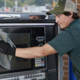 Mobile tech cleaning and inspecting ATM