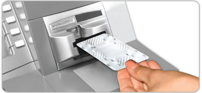 Generic credit card going into an ATM machine