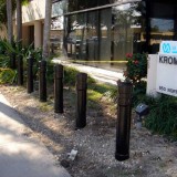 Black plastic Architectural Decorative Bollard Covers used for storefront protection