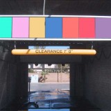 Plastic overhead clearance bar used for car wash entrance