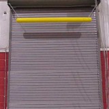 Plastic overhead clearance bar used for warehouse dock door