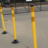 Yellow plastic delineator posts used for traffic control