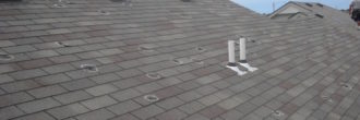Hail damage on the roof of a home