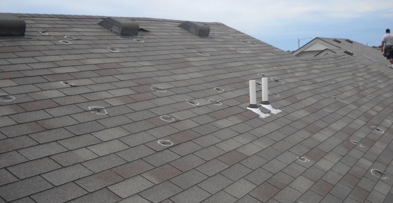 Hail damage on the roof of a home
