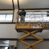 Worker on lift – interior painting